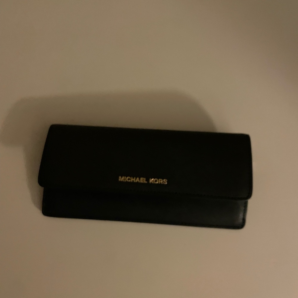Black Michael Kors wallet.